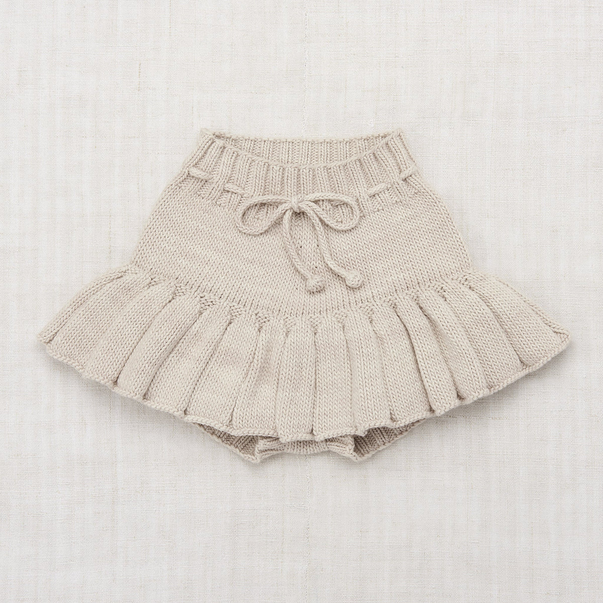 女童米色短裙