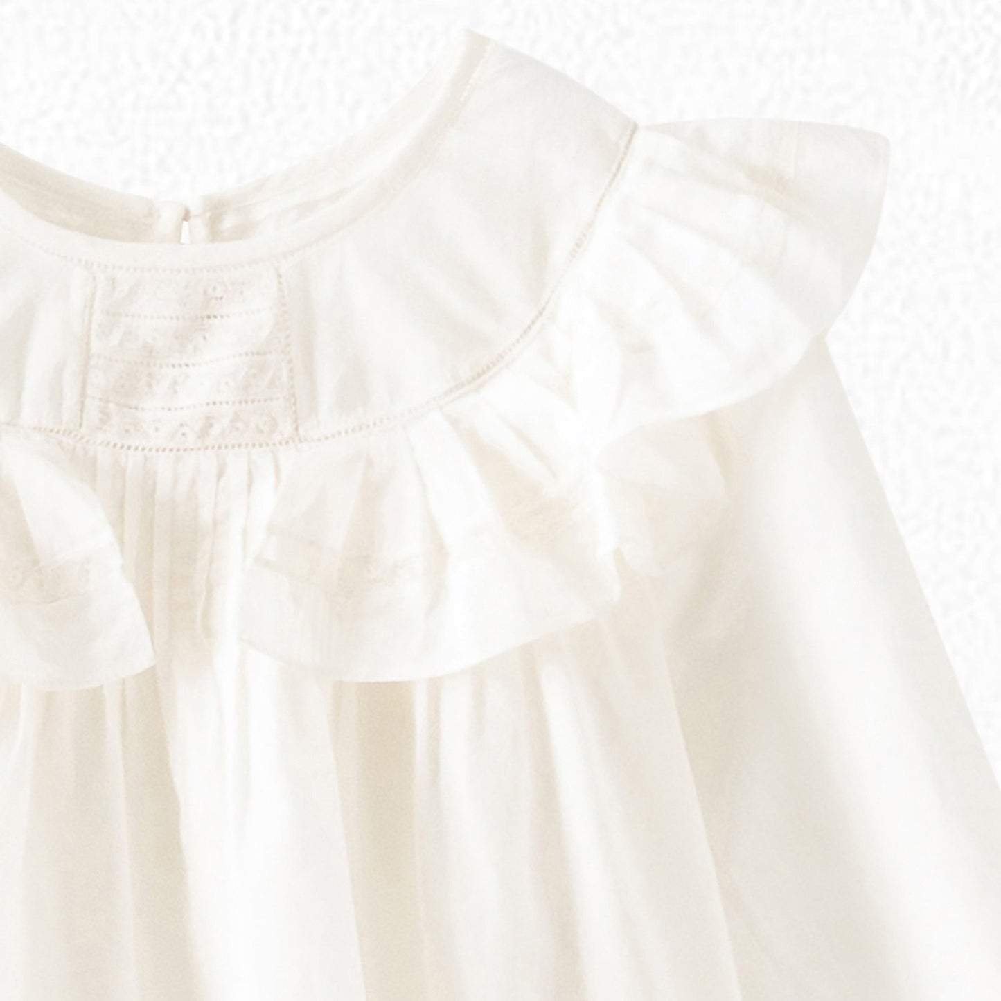 女童白色荷叶边棉上衣