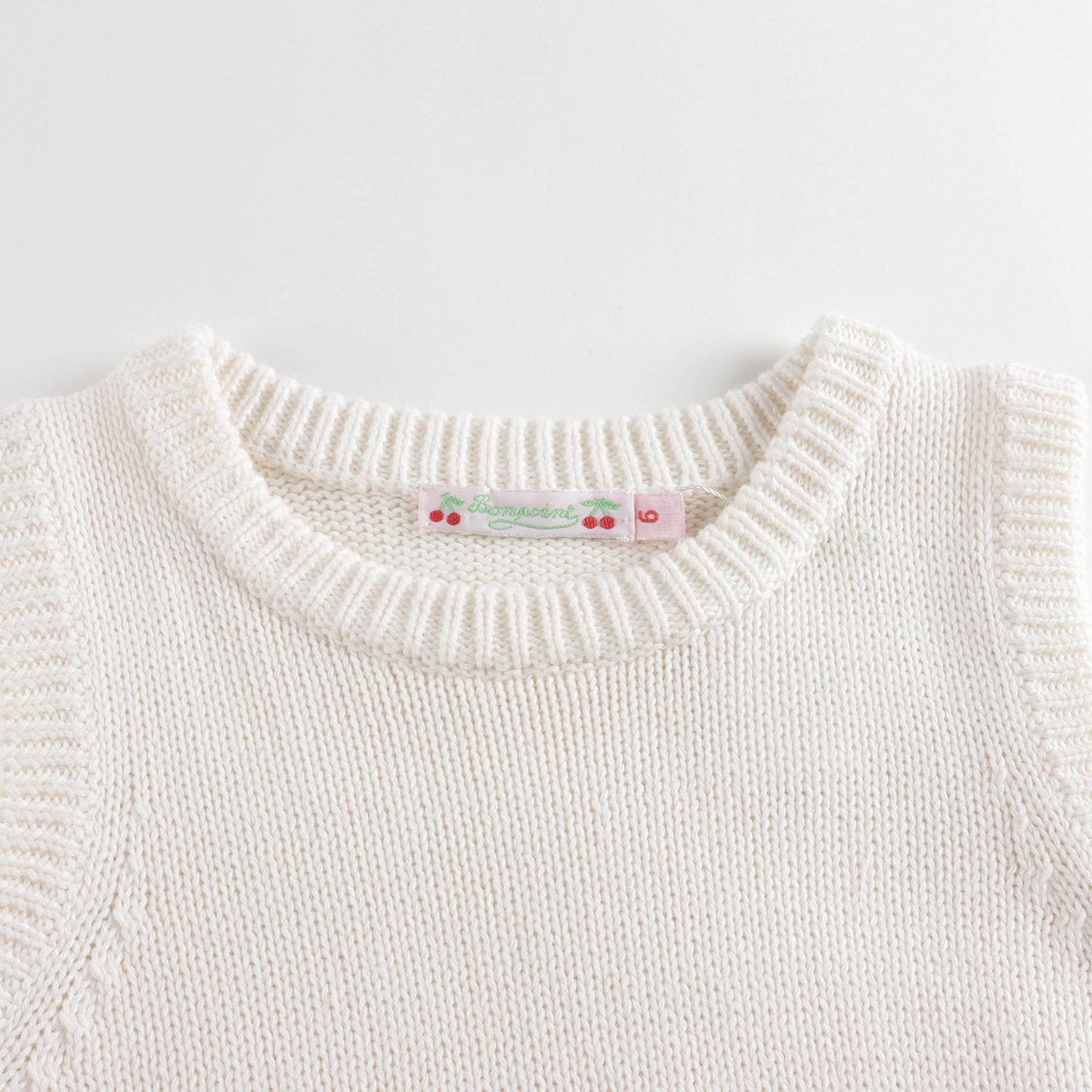 女童白色羊毛背心